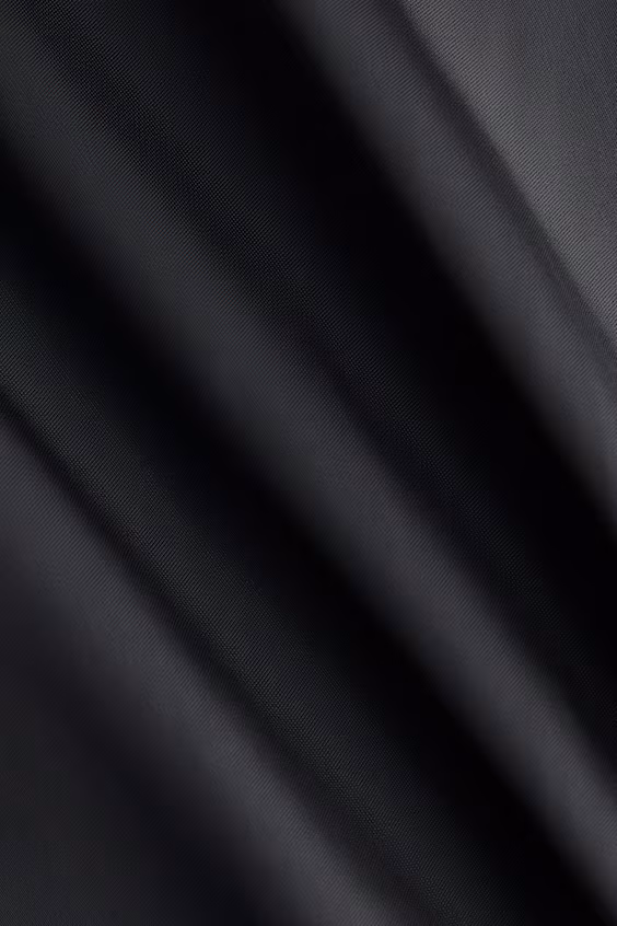 Брюки с волнистыми краями