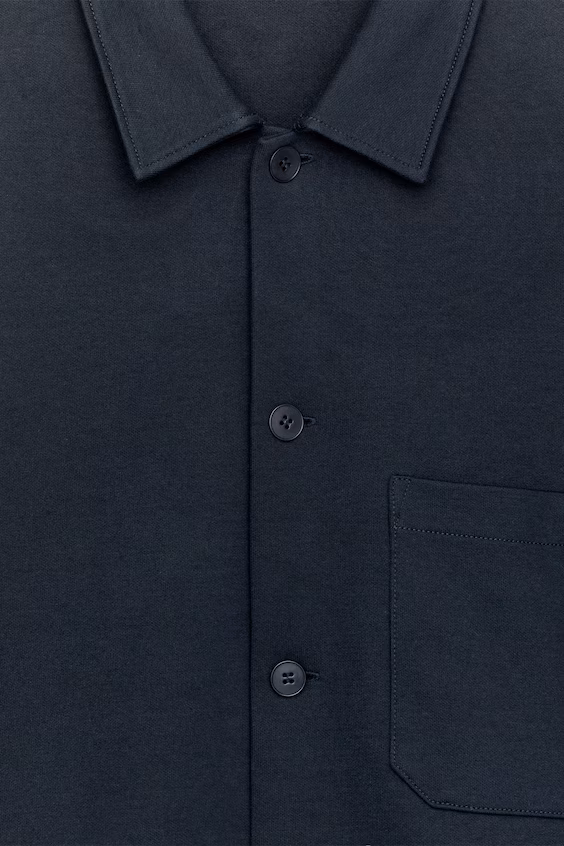 Пальто из мягкой вязаной ткани