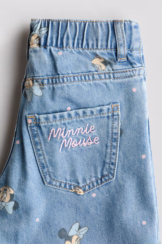 Джинсы широких брюк с принтом