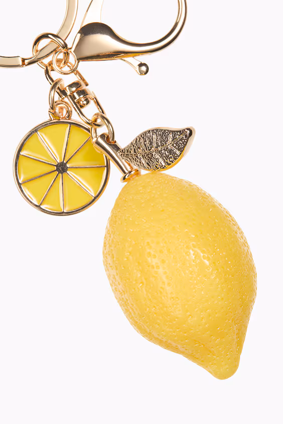 Аксессуар для чемодана с лимонами