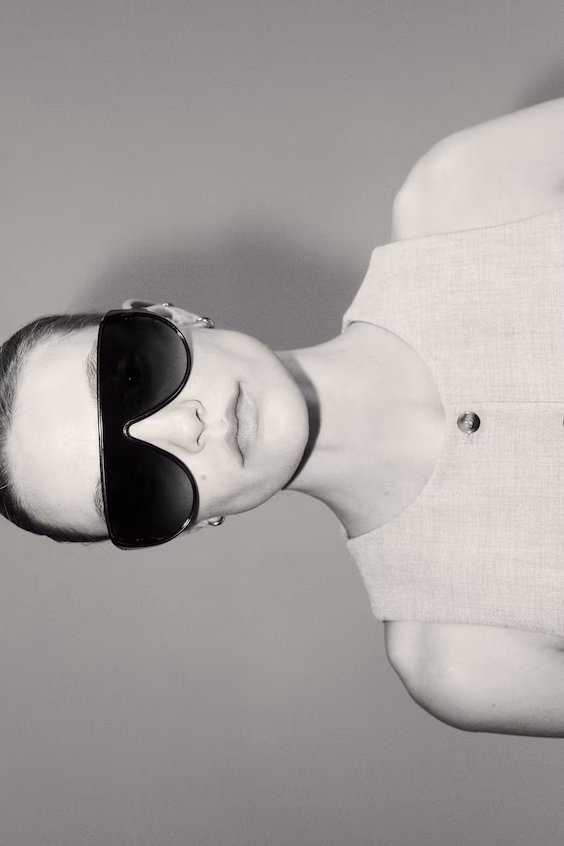 Длинный жилет