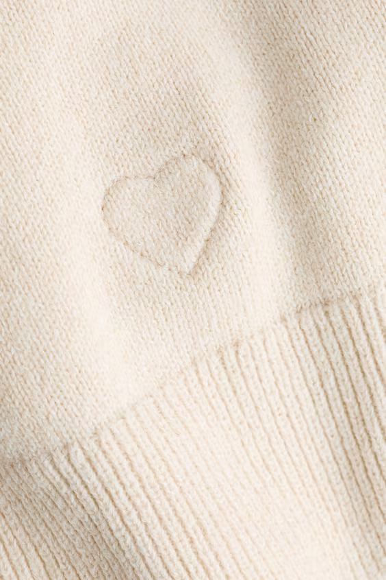 Пальто из тонкой вязаной ткани