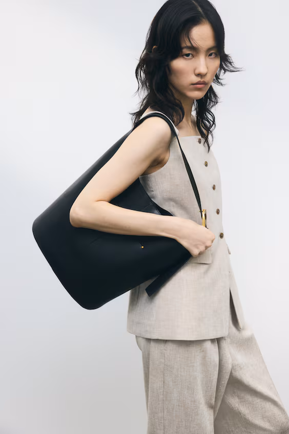 Длинный жилет