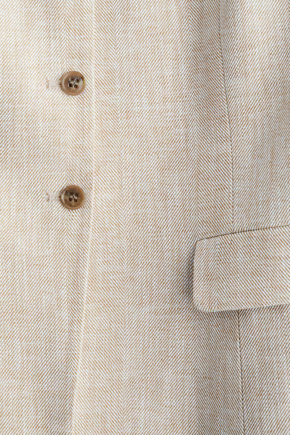 Длинный жилет