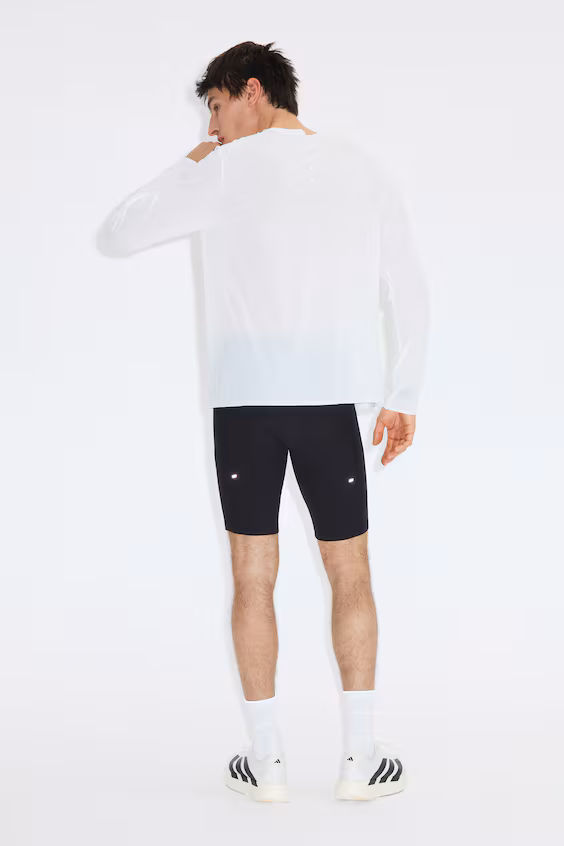 Короткие беговые леггинсы из быстросохнущей ткани