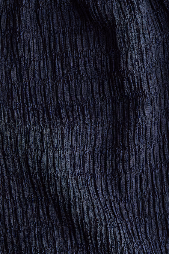 Широкие складки брюки