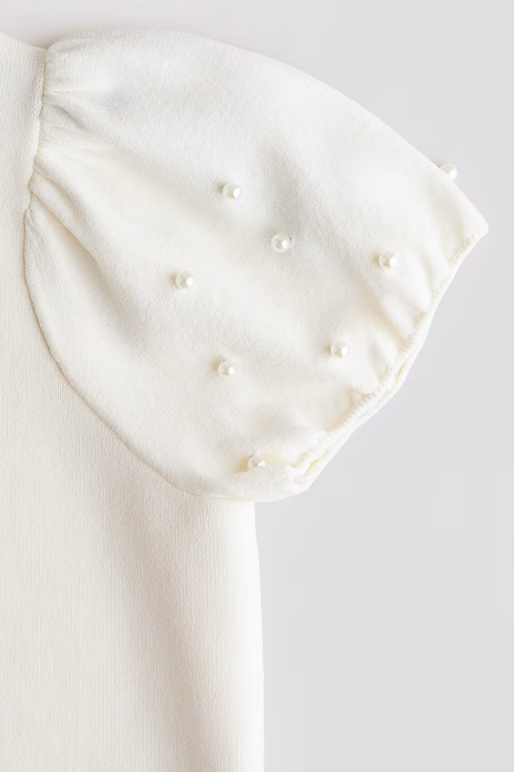 Свитер из тонкой вязаной ткани с бисером