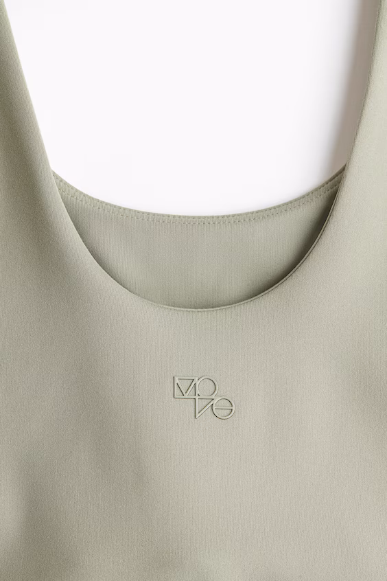 Топ для занятий спортом с технологией softmove™ и вшитым бюстгальтером