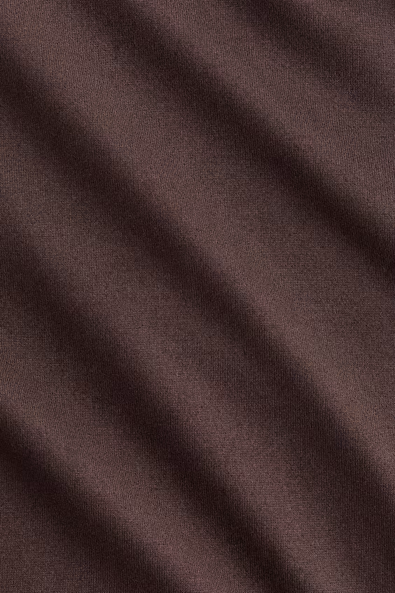 Брюки с расклешенными штанинами из мягкого трикотажа