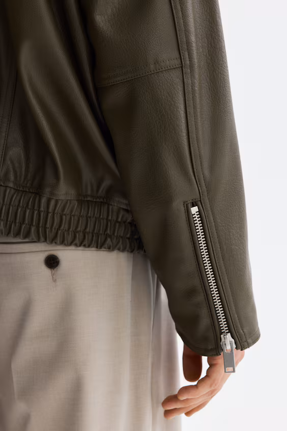 Пальто из покрытой ткани