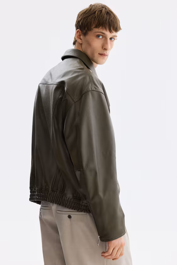 Пальто из покрытой ткани