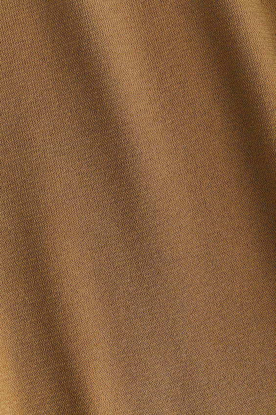 Брюки с драпировкой из тонкого трикотажа