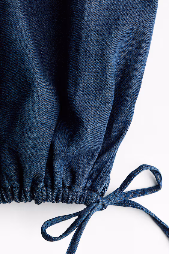 Джинсы в стиле бойфренд с застежкой на пуговицу и широкими штанинами