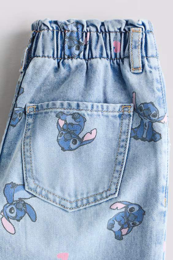 Джинсы свободного кроя с зауженными штанинами