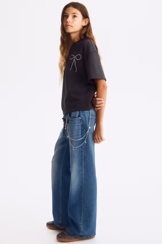 Джинсы baggy fit с расклешёнными штанинами