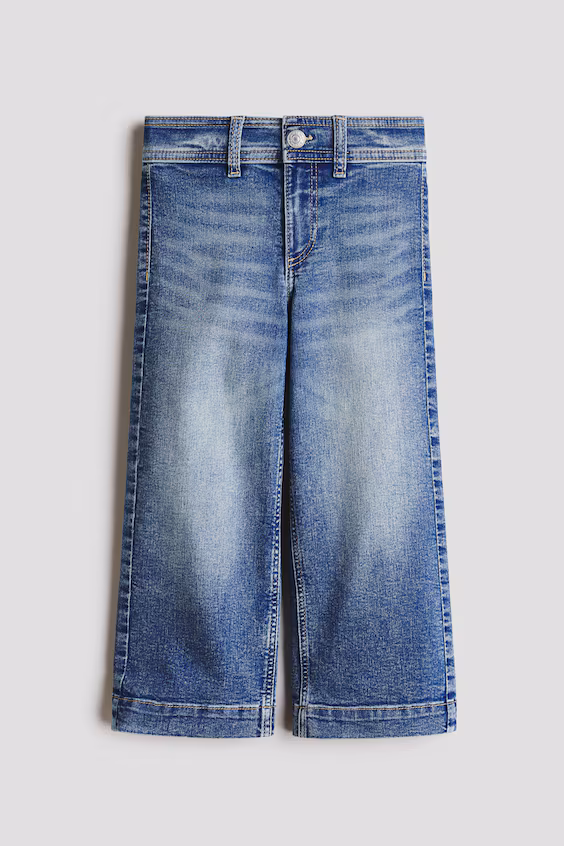 Джинсы slim fit с широкими штанинами