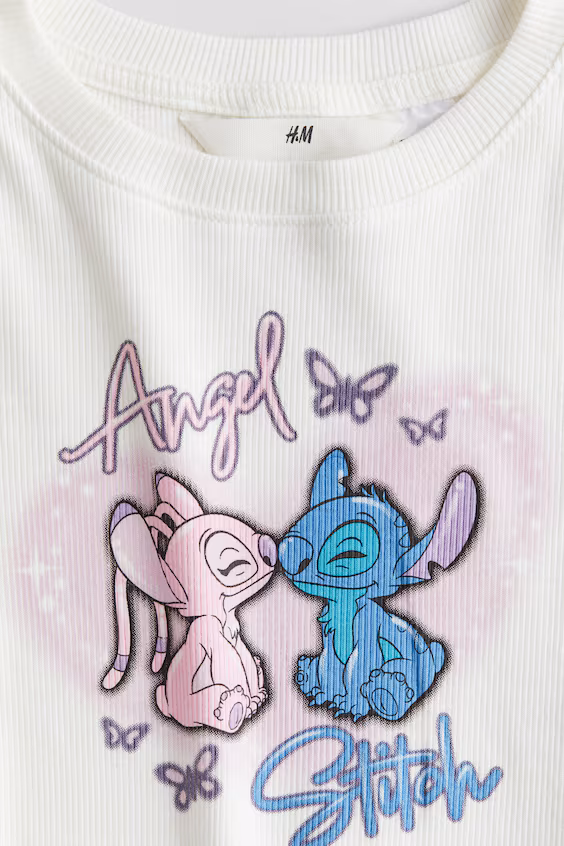 Свитер в тонкую полоску с принтом