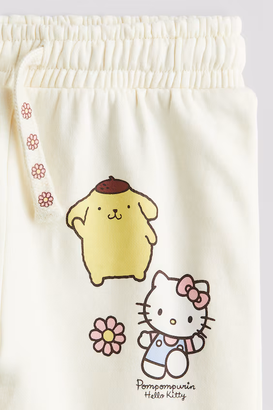 Брюки-джоггеры с принтом и трикотажной отделкой