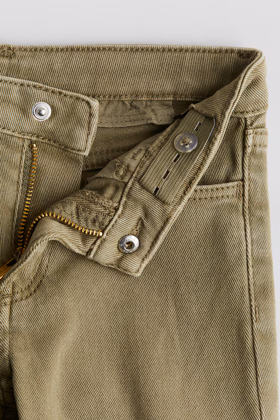 Джинсы bootcut с карманами cargo