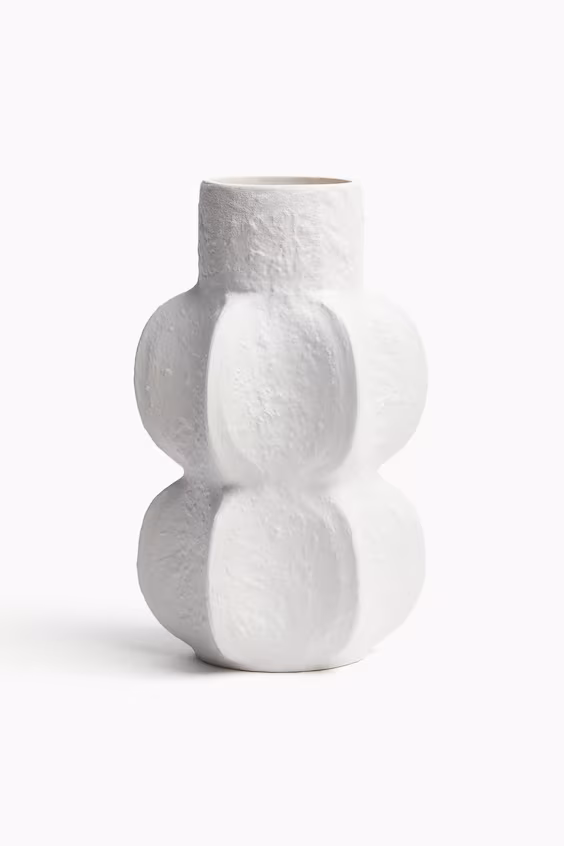 Текстурированная глиняная кувшин