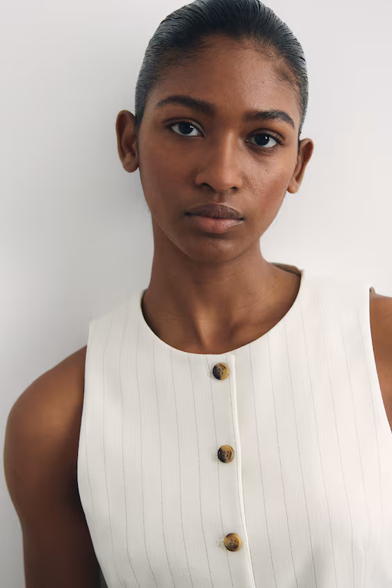 Длинный жакет без рукавов