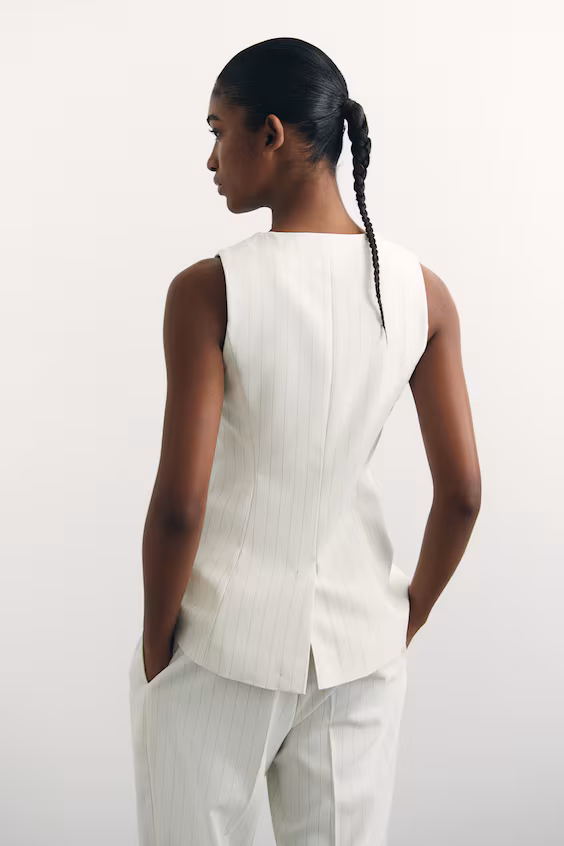 Длинный жакет без рукавов