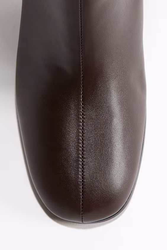 Сапоги на высоком каблуке до колена