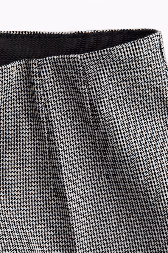 Брюки с защипами