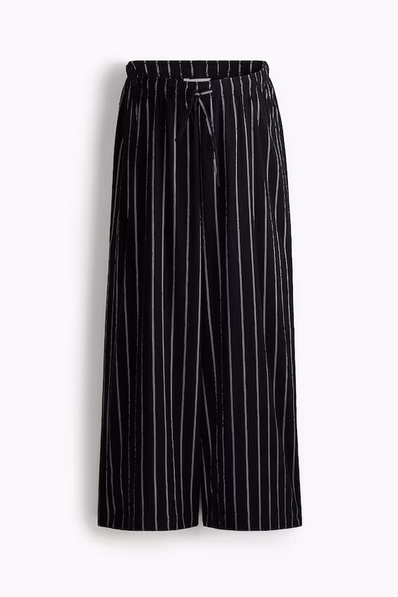 Рваные брюки mamа