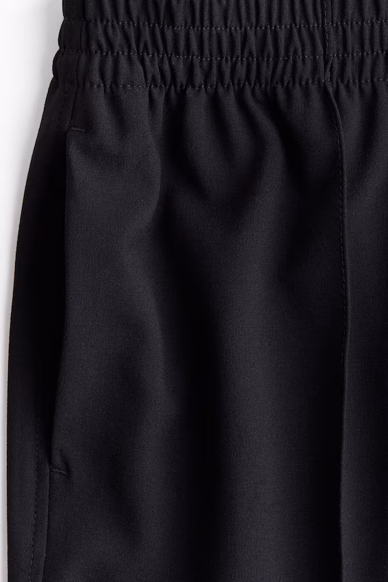 Брюки с широкими складками